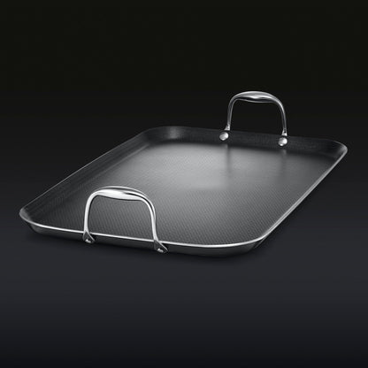 The HexClad Hybrid Double Burner Griddle on a black background.